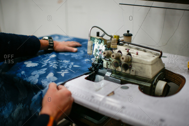 Woman working on sewing machine