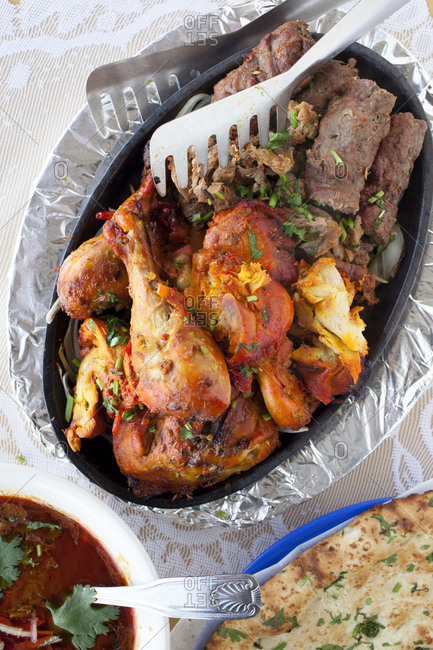 Tandoori chicken and beef with nihari and garlic naan