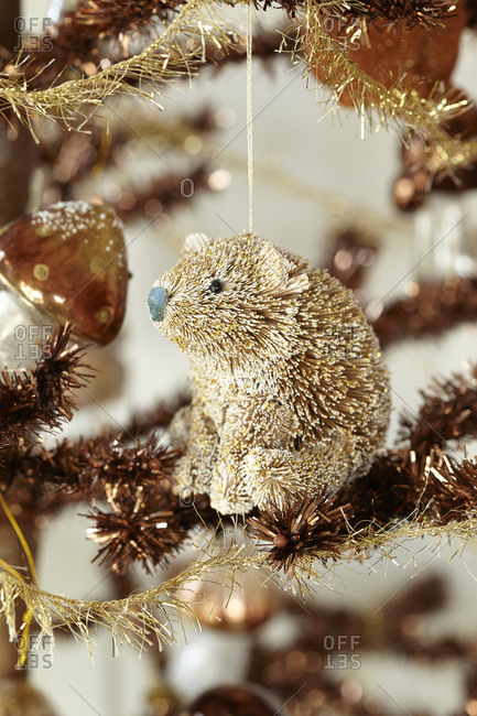 Golden bear figurine on a Christmas tree