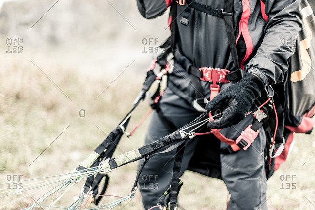 Close up of a parachutist and his gear