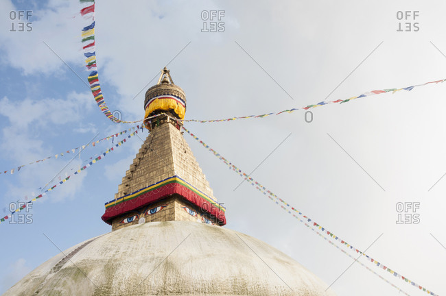Stupa sanctuary with prayer flags, Bodnath, Nepal