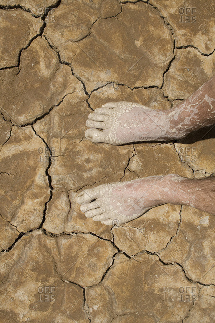 Two feet on dry earth