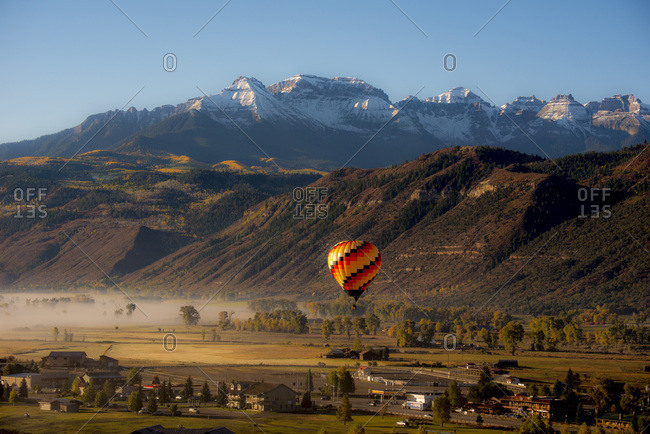 Hot air balloon flying over Ridgway in Colorado, USA