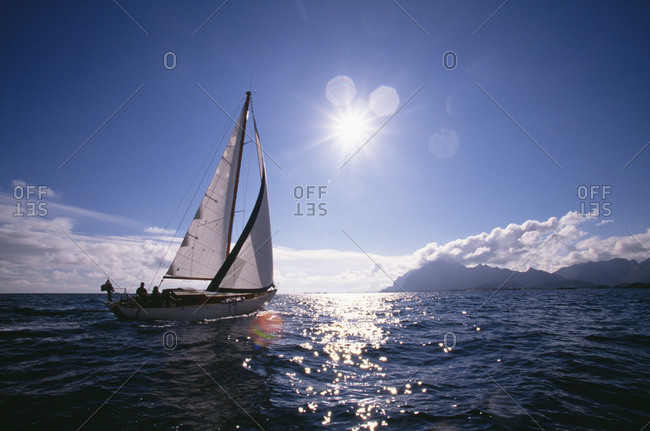 Sailboat on water in sunny weather