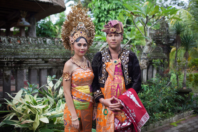 Couple in traditional wedding garb in Bali, Indonesia