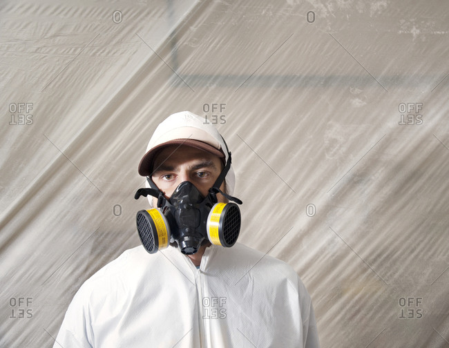 Portrait of an industrial painter in mask