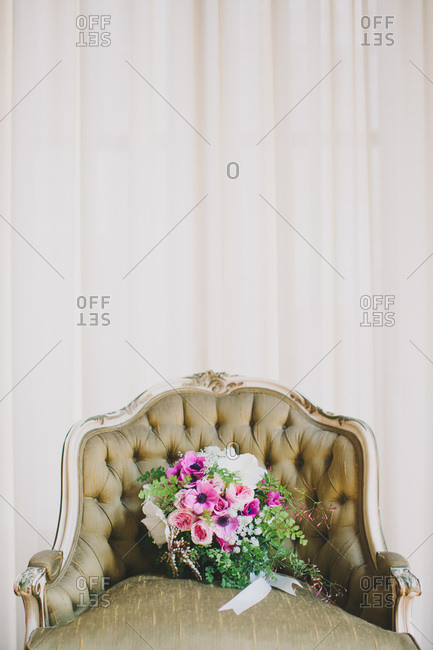 Wedding bouquet in a baroque armchair