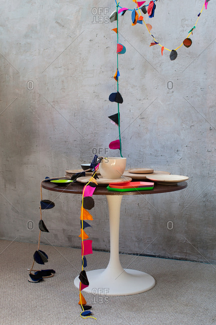 Tulip table with streamers and dishes