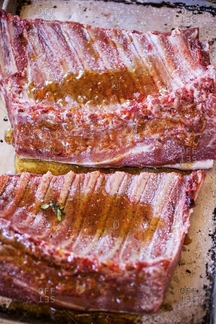 Wild boar ribs drizzled with olive oil