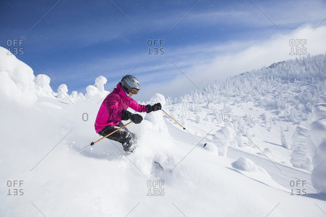 Woman skiing in mountains