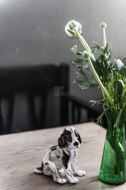 A glass dog figurine on a table