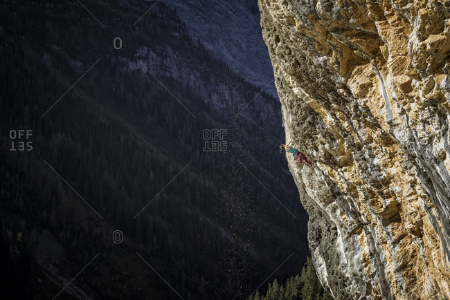 Woman climbing mountain in Gimmelwald, Switzerland