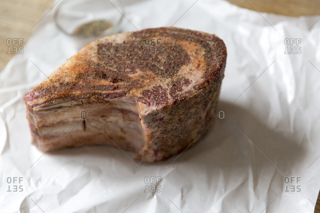 A seasoned cut of meat