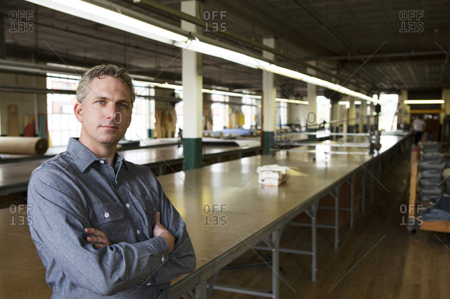 Portrait of man in a garment factory