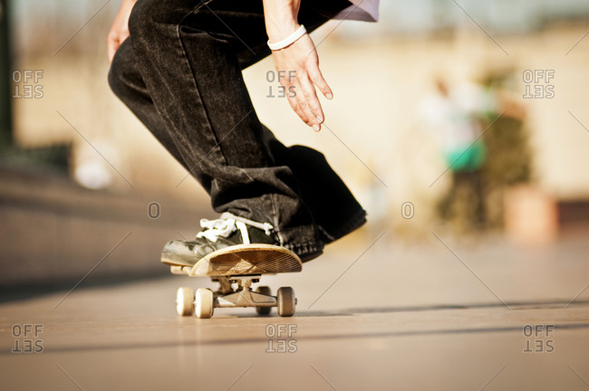 Low level view of skater on skateboard