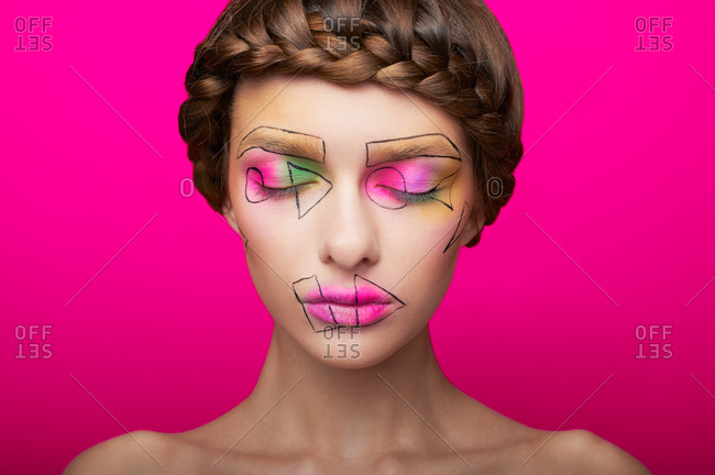 Portrait of a woman with cubism abstract make up