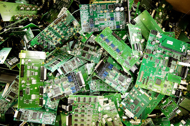 A pile of computer circuit boards prepared to be recycled