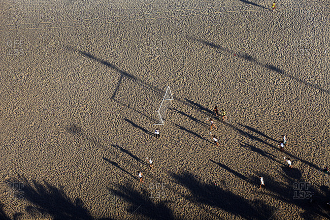 Youngsters play beach soccer in the late afternoon on Ipanema beach
