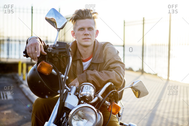 Portrait of a biker on his motorcycle