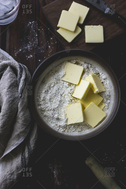 Butter and gluten-free flour in a mixing bowl