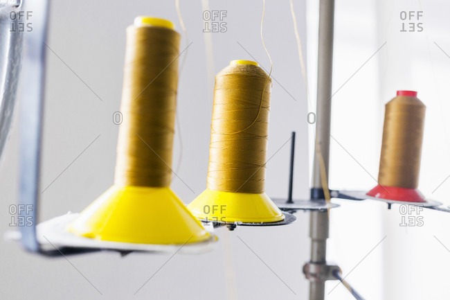 Thread spools set up for a serger machine