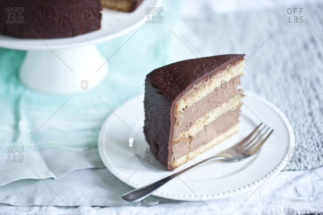 Slice of cake with floral relief design