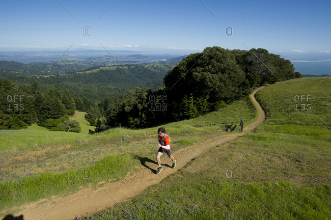 Man runs trails in the Marin Headlands in California