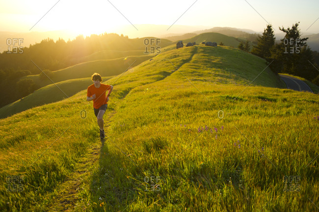 Man runs trails in the Marin Headlands in California