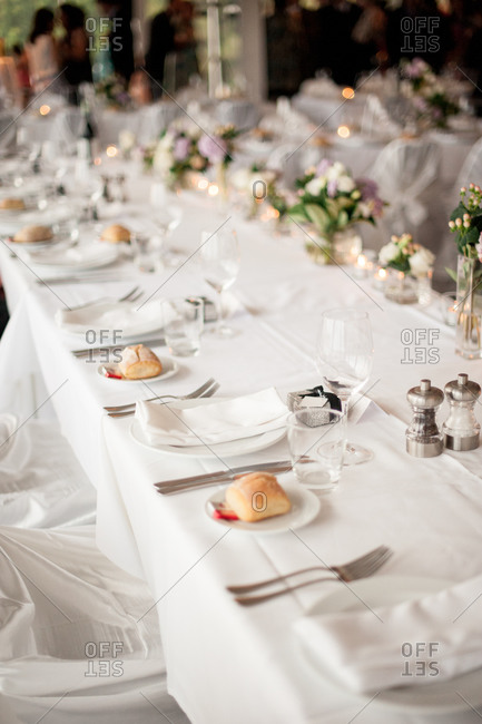 Long banquet table set for a wedding reception