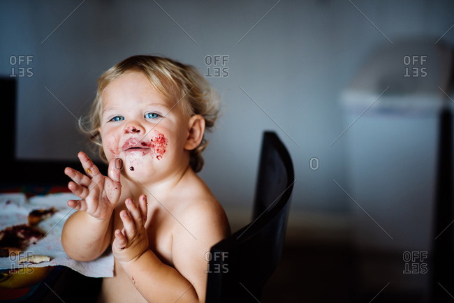 Boy with jam on his face