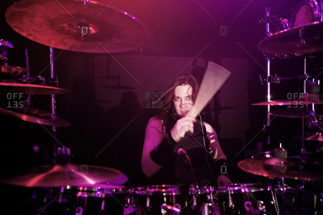 A drummer in a 1980s cover band