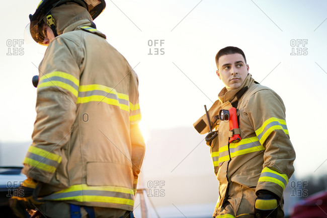 A fireman looks over his shoulder
