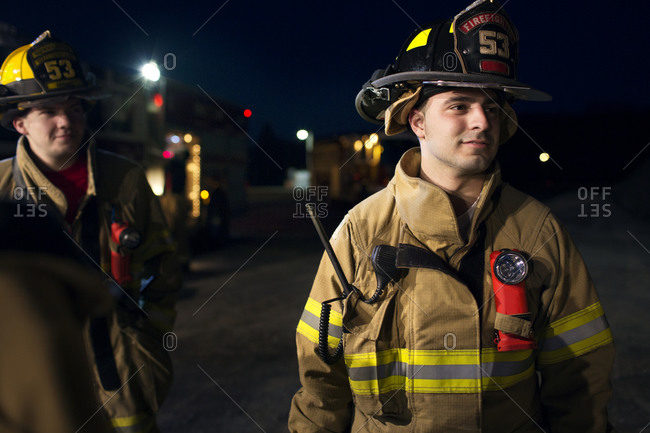 Firefighters gathering at night