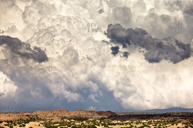Thunderstorms roll across the landscape of New Mexico