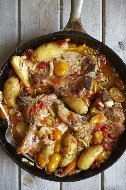 Meat and potato stew in cast iron pan