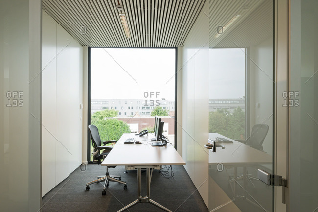Private office with window in a modern building