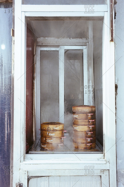 Bamboo steamers stacked on a shelf in China