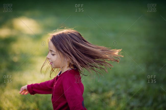 A girl spins around