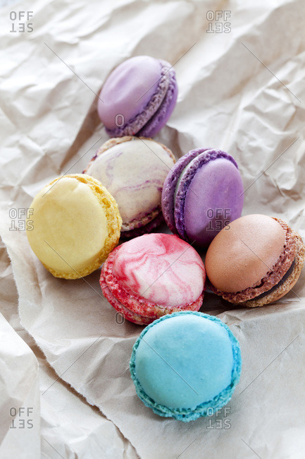 Different macarons on white paper