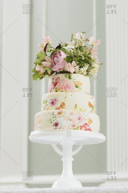 Floral wedding cake on a cake stand