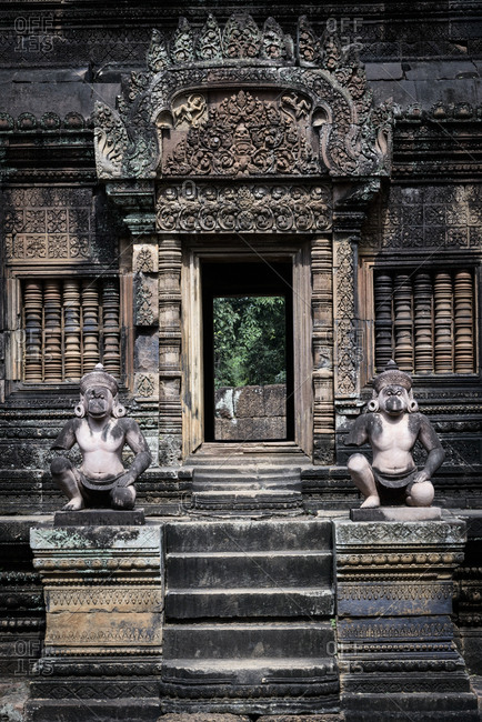 Monkey statues at a doorway of  Banteay Srei temple in Angkor Wat, Cambodia