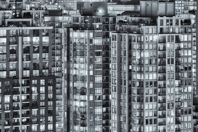 High-rise apartment buildings at night in Yaletown, Vancouver, Canada