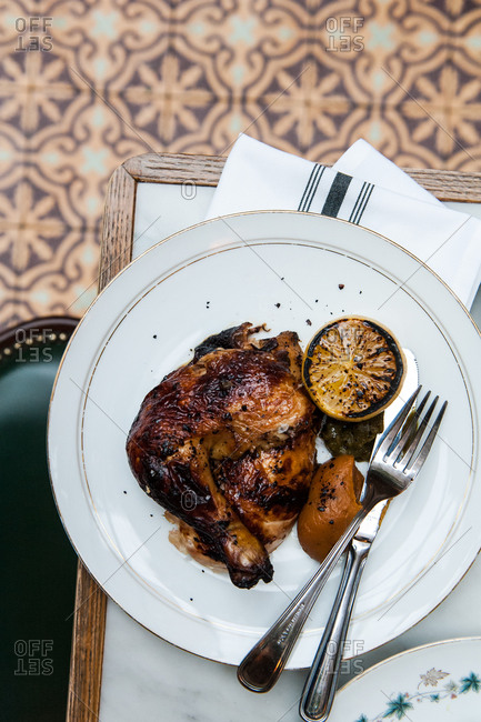 Roasted chicken thigh with grilled lemon