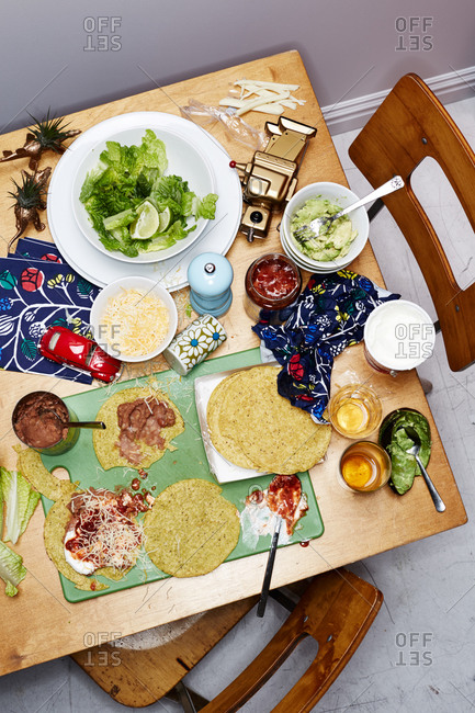Tortillas and ingredients for Mexican dish from above