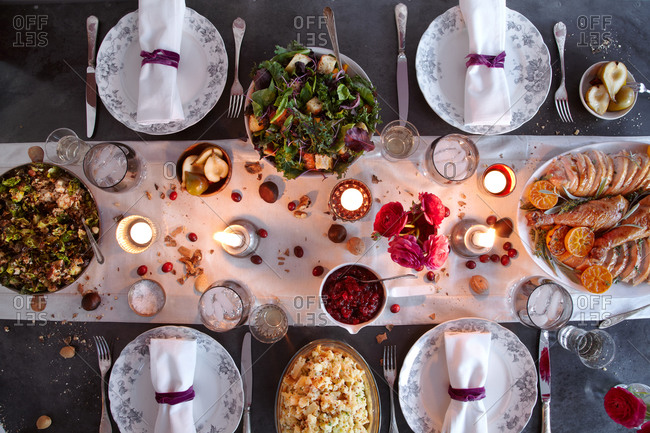 Overhead view of a dining table set for Thanksgiving dinner