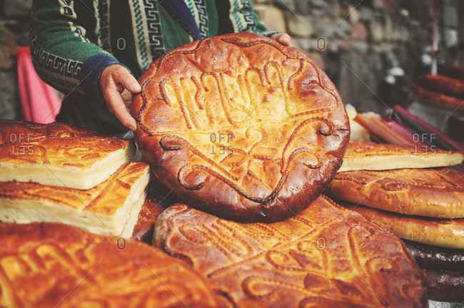 Woman selling gatas, traditional Armenian breads
