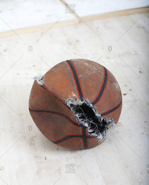 A torn basketball