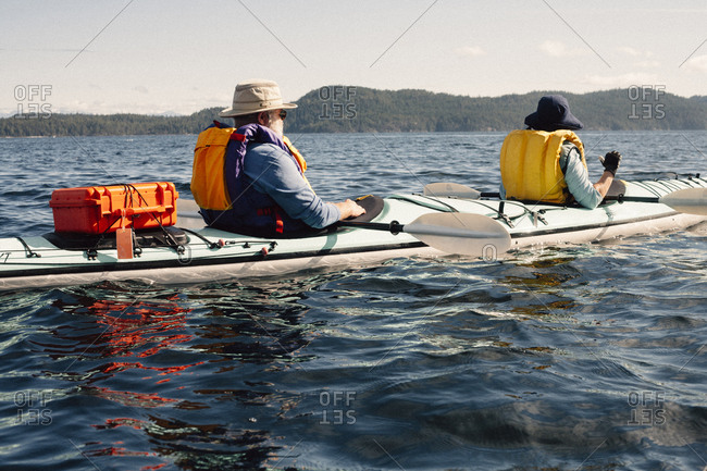 Paddlers in a tandem kayak