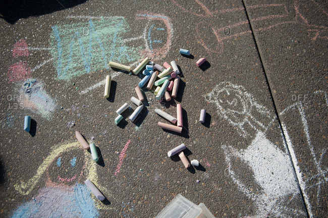 Chalk on pavement with drawings