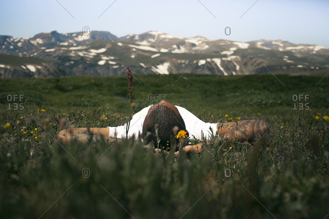 Man looking at view from Beartooth Highway in Montana
